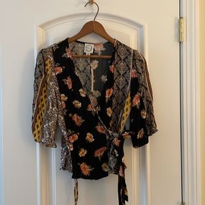 Francesca’s Blue Rain 3/4 sleeve wrap top